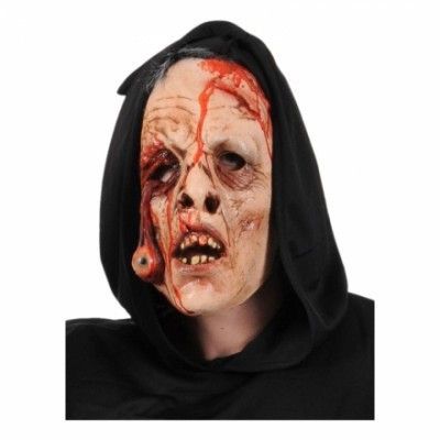 Blodig mask med hängande öga