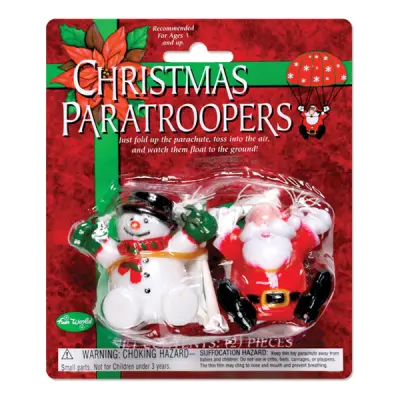 Tomte och snögubbe med fallskärm